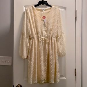 Long sleeve, cream dress, size M.